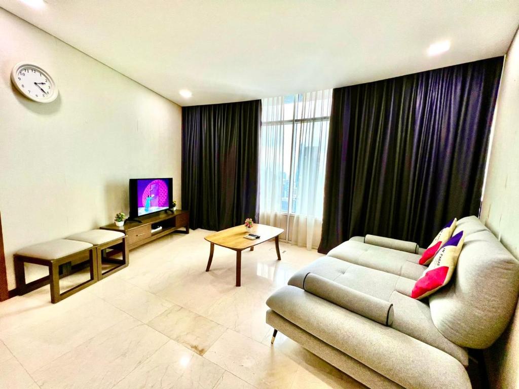 TV a/nebo společenská místnost v ubytování Vortex Serviced Apartment KLCC By Elite Suites
