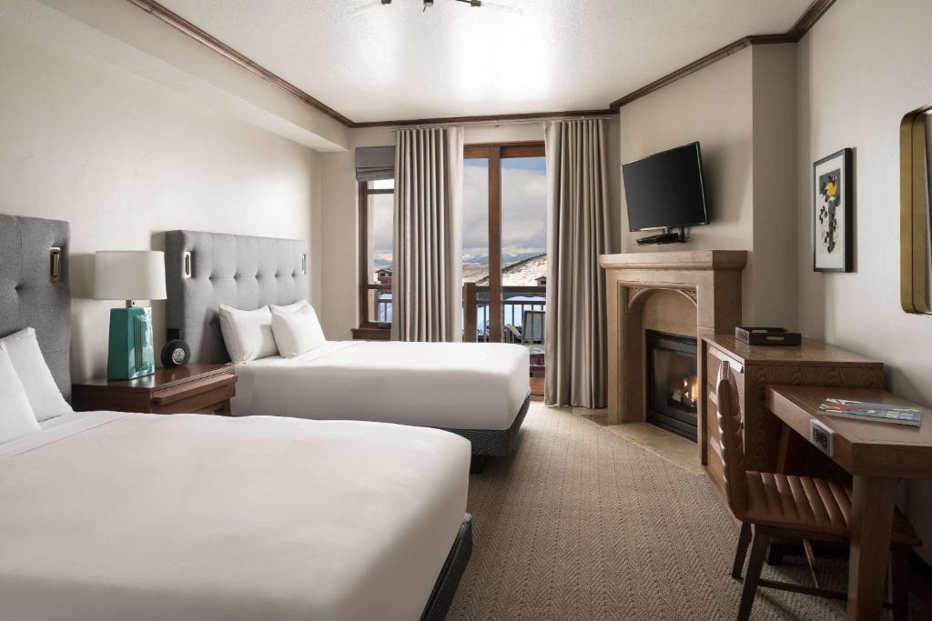 Postel nebo postele na pokoji v ubytování Hyatt Centric Park City