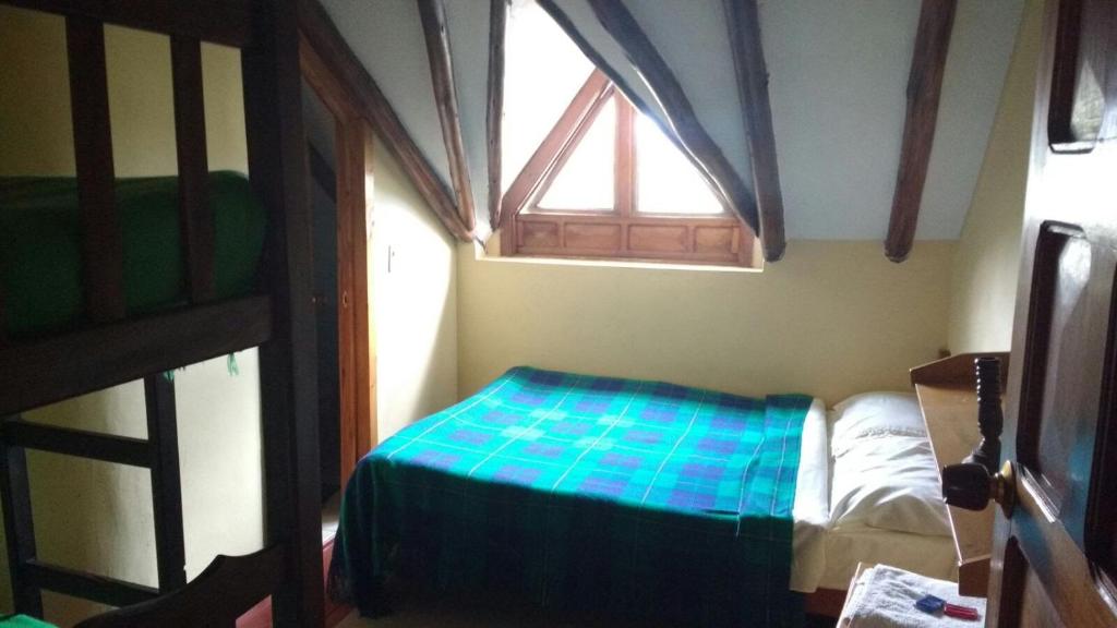 Postel nebo postele na pokoji v ubytování Hotel Campestre los Duraznos