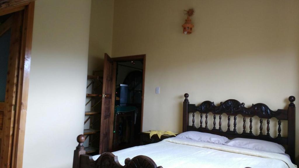 Postel nebo postele na pokoji v ubytování Hotel Campestre los Duraznos