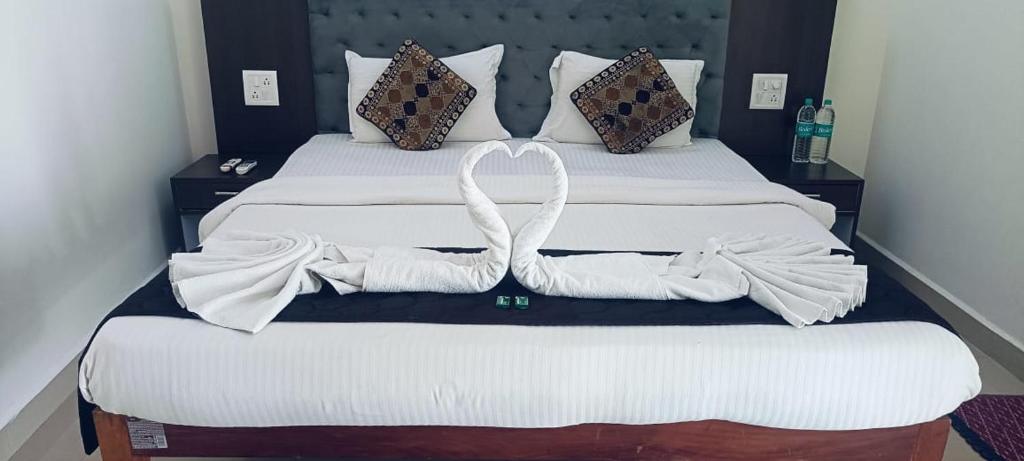 Postel nebo postele na pokoji v ubytování Hotel Baga inn