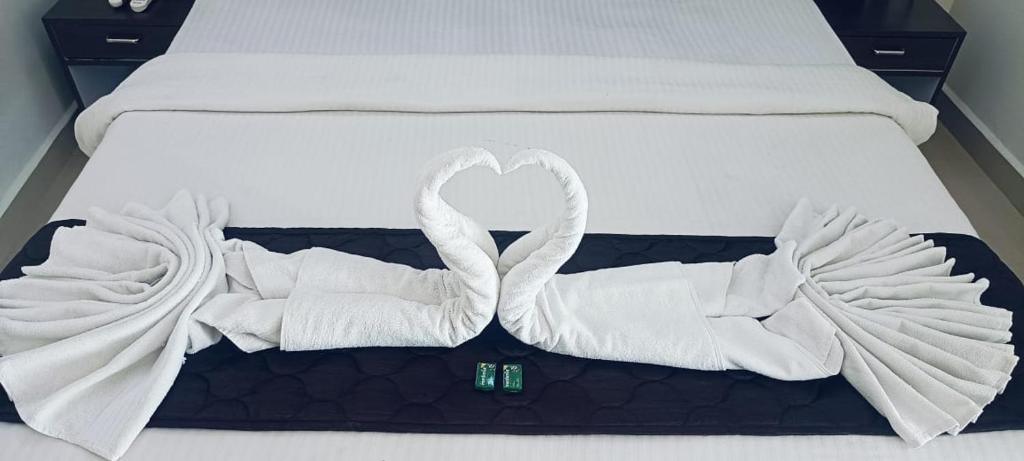 Postel nebo postele na pokoji v ubytování Hotel Baga inn