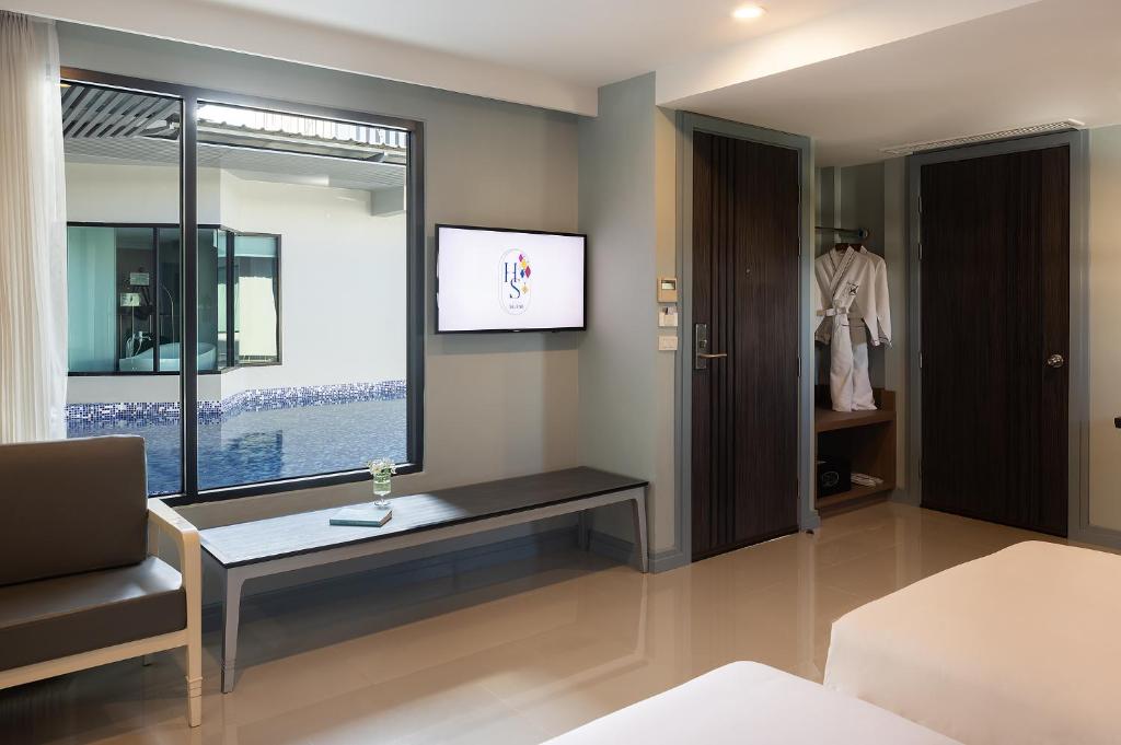 Postel nebo postele na pokoji v ubytování Hotel Selene Chiang Rai - SHA Certified