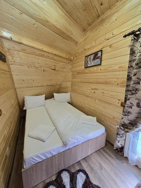 Postel nebo postele na pokoji v ubytování Cabana MARA