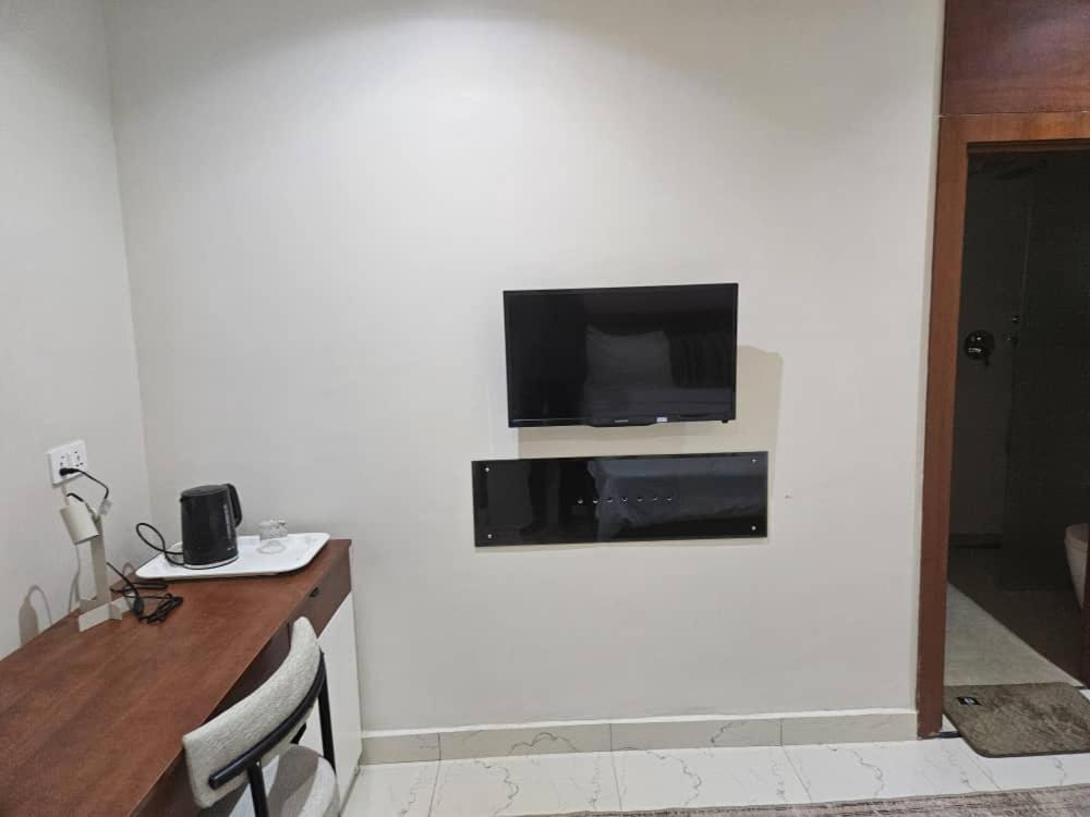 TV a/nebo společenská místnost v ubytování C apartment