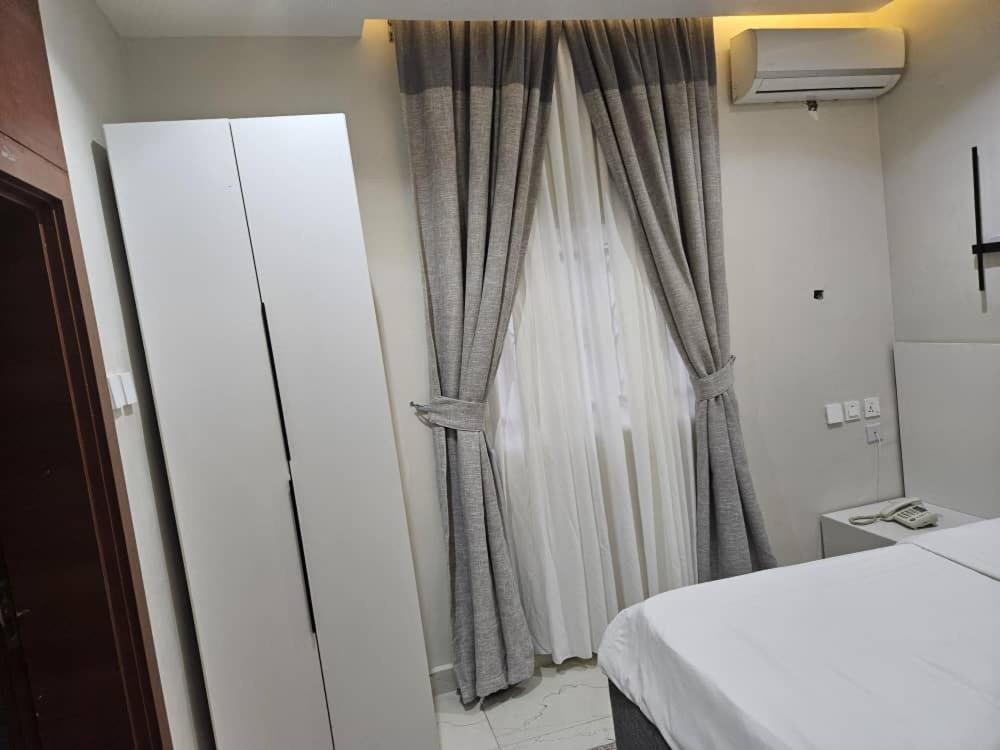 Postel nebo postele na pokoji v ubytování C apartment