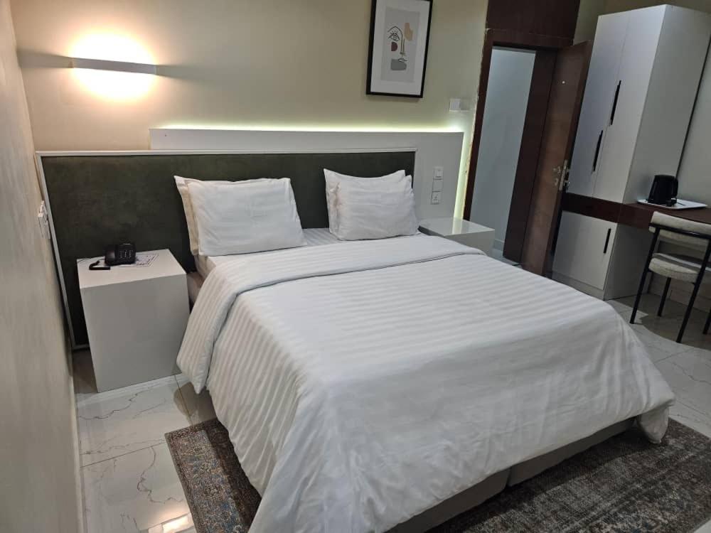Postel nebo postele na pokoji v ubytování C apartment
