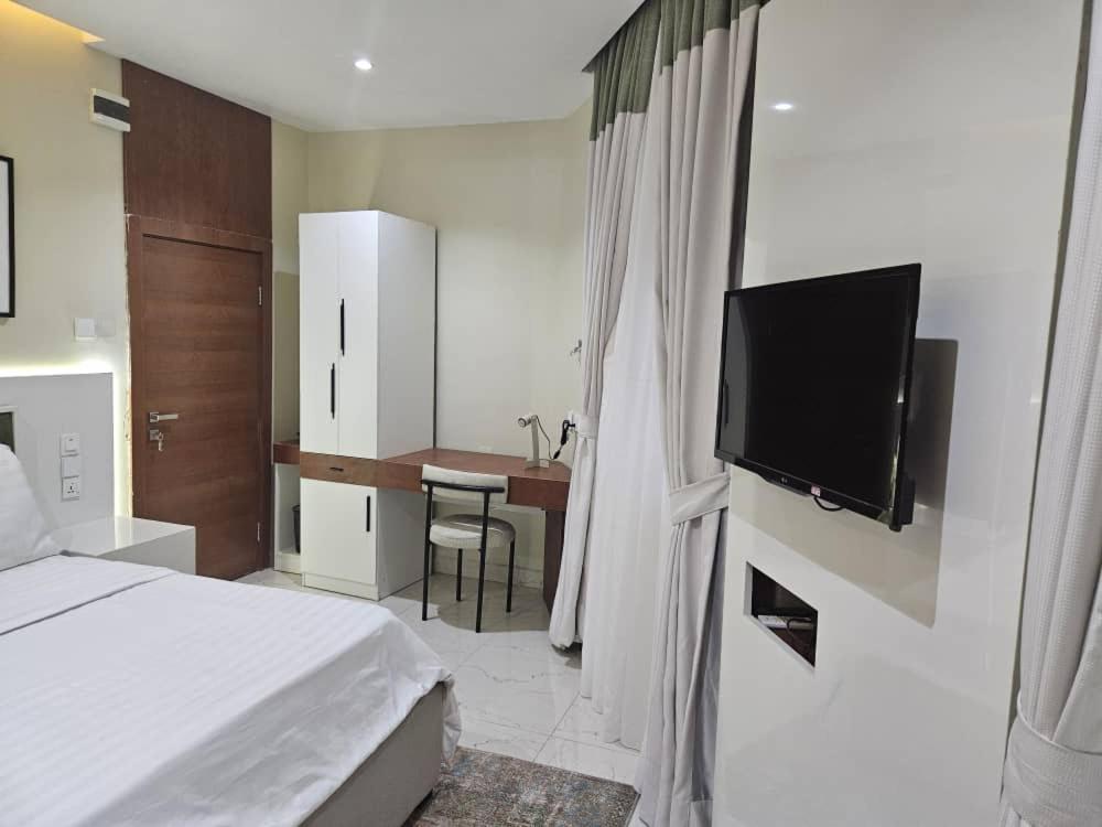 TV a/nebo společenská místnost v ubytování C apartment