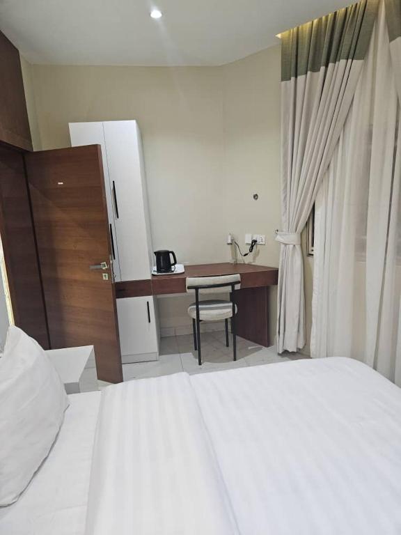 Postel nebo postele na pokoji v ubytování C apartment