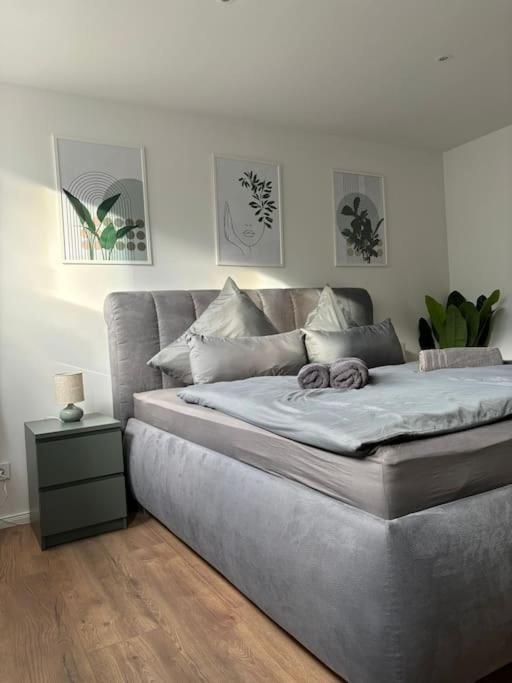 Ένα ή περισσότερα κρεβάτια σε δωμάτιο στο Geeste-Apartment Bremerhaven