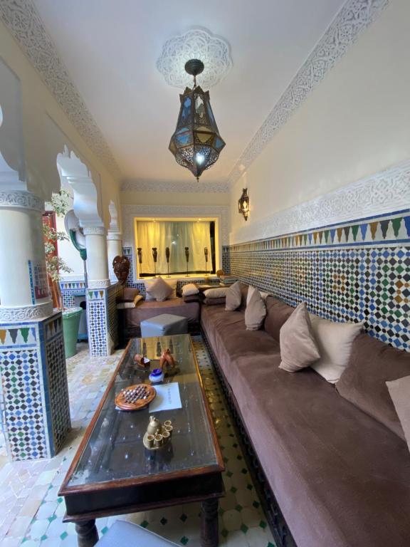 Uma área de estar em Riad Dar Teranga Hotel & Spa