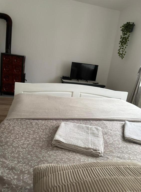 Postel nebo postele na pokoji v ubytování Kiadó apartman