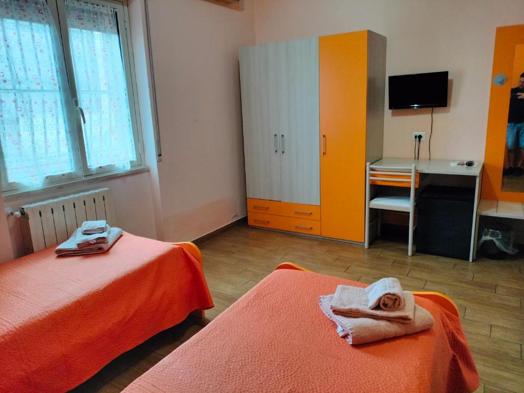 Postel nebo postele na pokoji v ubytování B&B Max