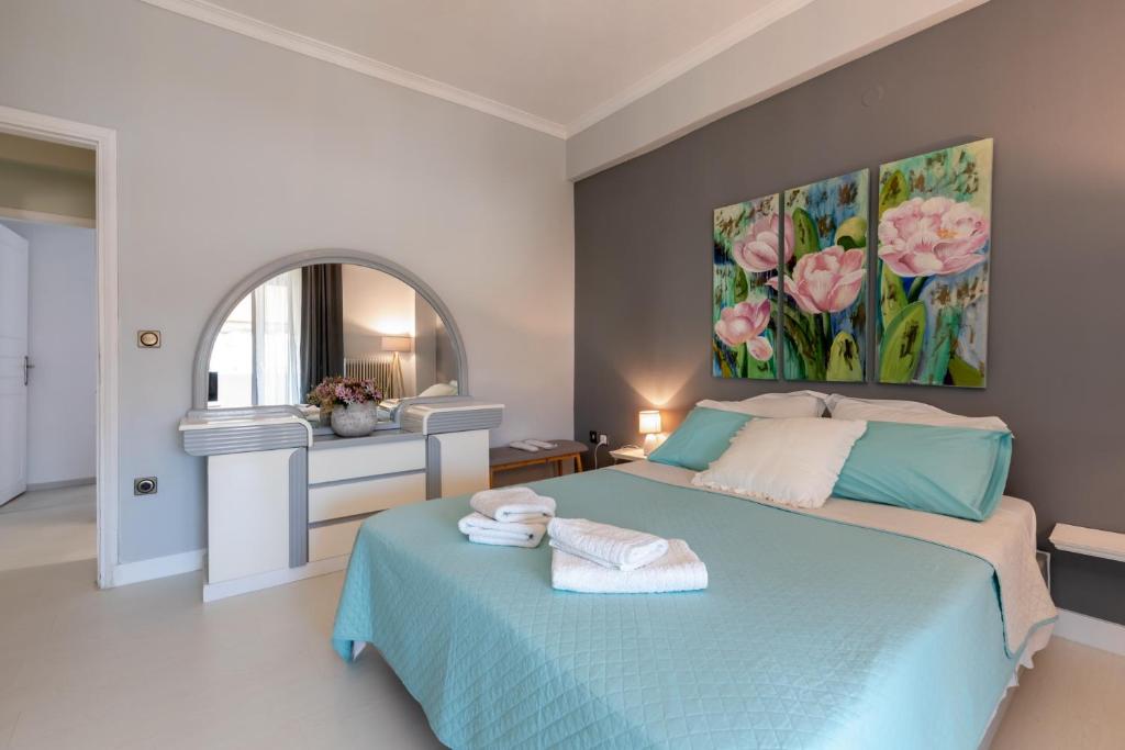 Łóżko lub łóżka w pokoju w obiekcie Chania dream apartment