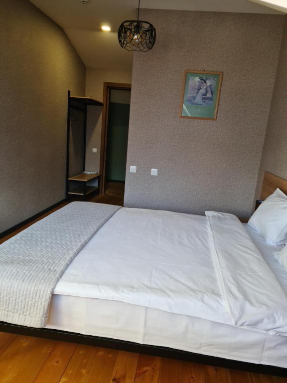 Letto o letti in una camera di Hilltop Kazbegi