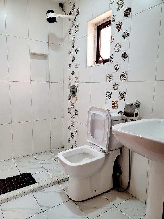 Koupelna v ubytování Nairobi Glory Palace Hotel