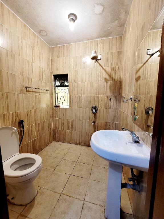 Koupelna v ubytování Nairobi Glory Palace Hotel