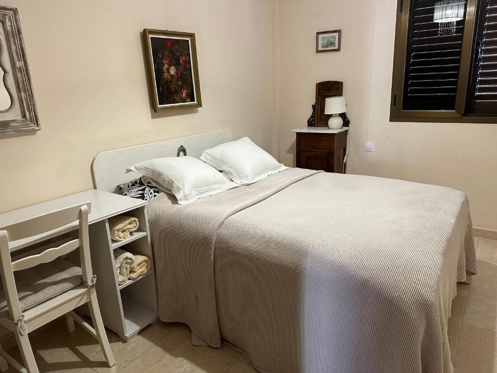 Postel nebo postele na pokoji v ubytování Casa Vivien