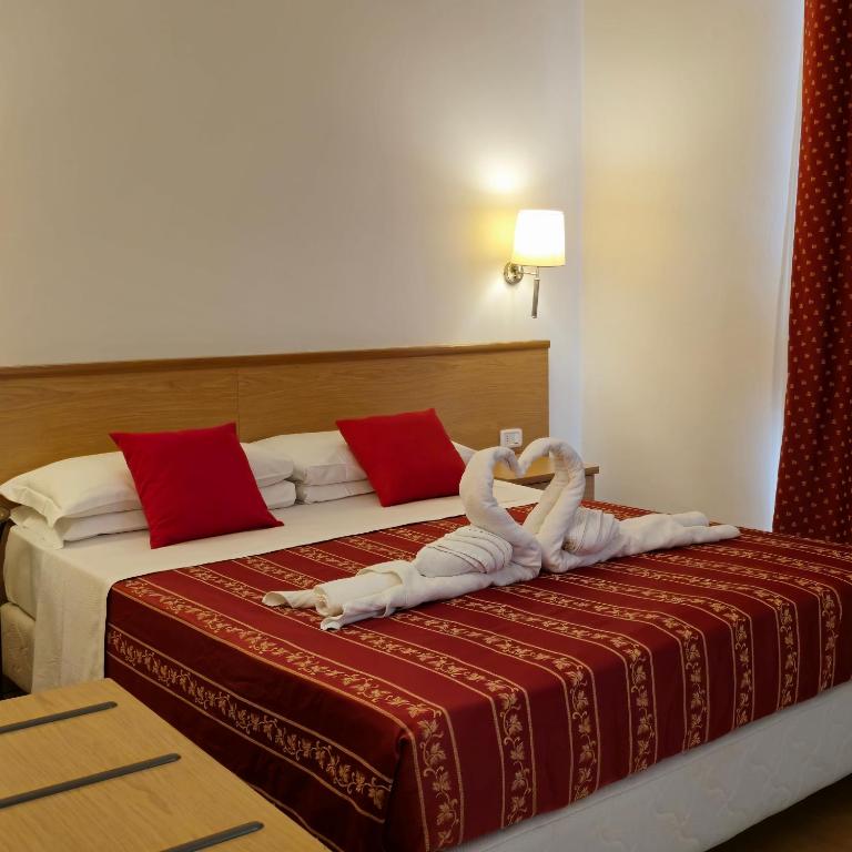 Postel nebo postele na pokoji v ubytování Hotel Marco Polo Airport hotel