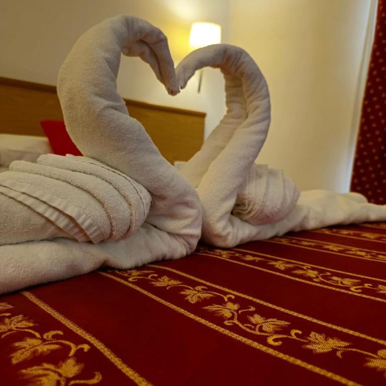 Postel nebo postele na pokoji v ubytování Hotel Marco Polo Airport hotel