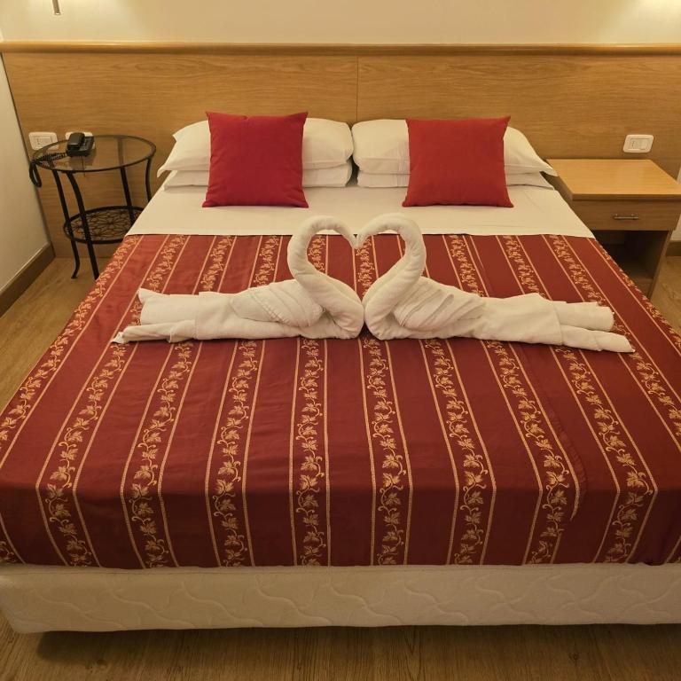 Postel nebo postele na pokoji v ubytování Hotel Marco Polo Airport hotel