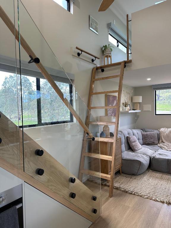 Postel nebo postele na pokoji v ubytování Kaiser Ridge - eco stay