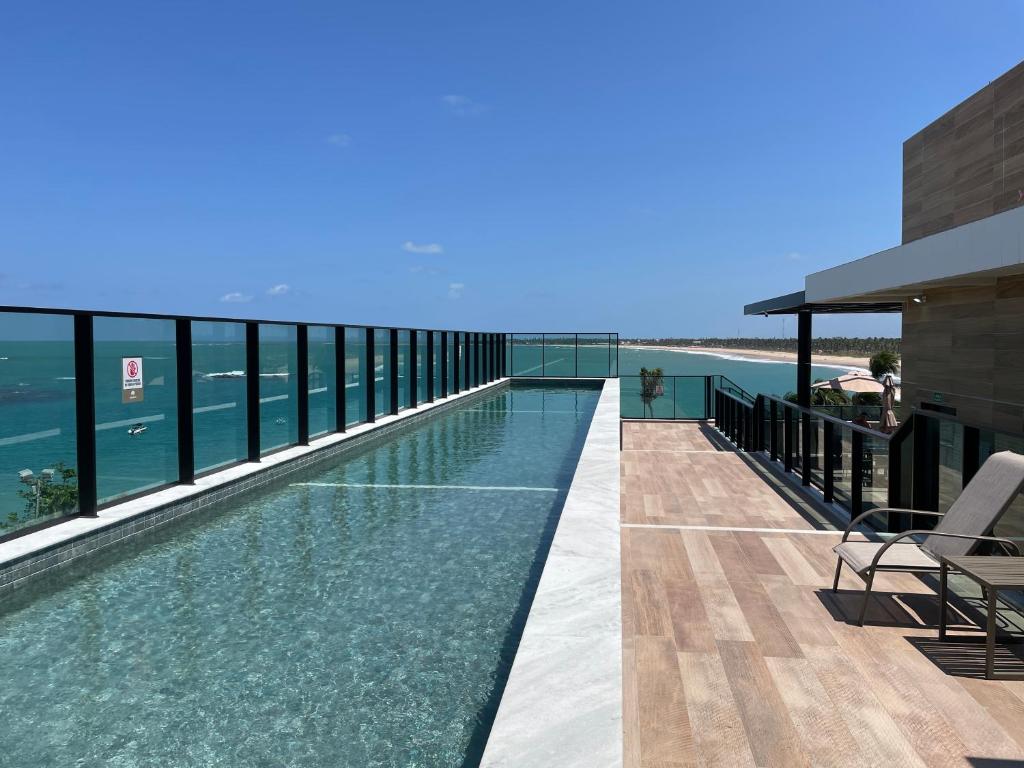 Swimmingpoolen hos eller tæt på Makadamia- Cantinho do mar Beira-mar em Porto de Galinhas