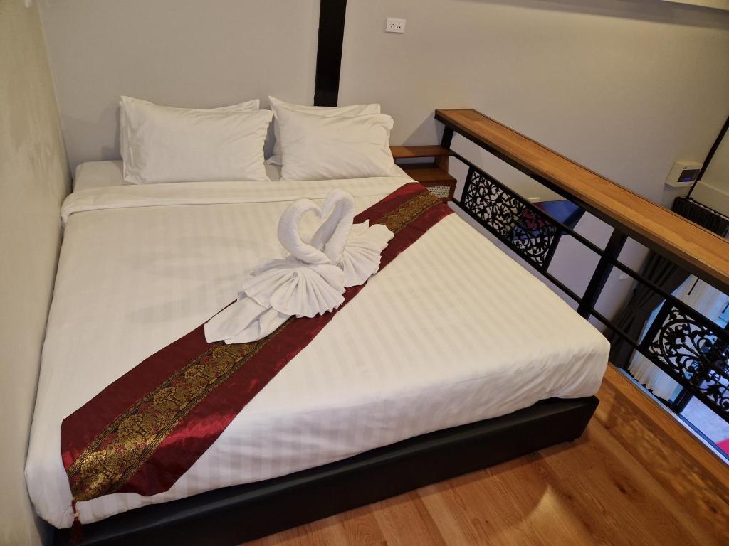 Postel nebo postele na pokoji v ubytování Atlas Central
