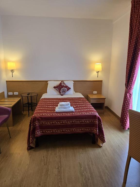 Postel nebo postele na pokoji v ubytování Hotel Marco Polo Airport hotel
