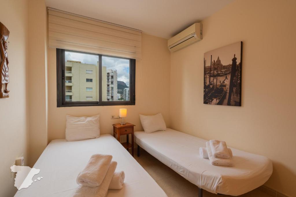 Postel nebo postele na pokoji v ubytování CostaBlancaDreams Morello 5A in Calpe