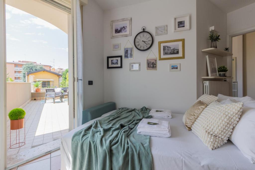Postel nebo postele na pokoji v ubytování Crema, terrazza, a pochi passi dal centro città