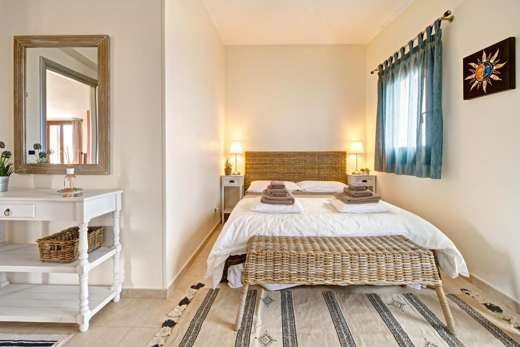 Postel nebo postele na pokoji v ubytování La Terra dei Mari Room & Relax