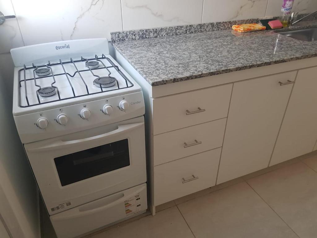 Kuchyň nebo kuchyňský kout v ubytování Complejo San Emilio