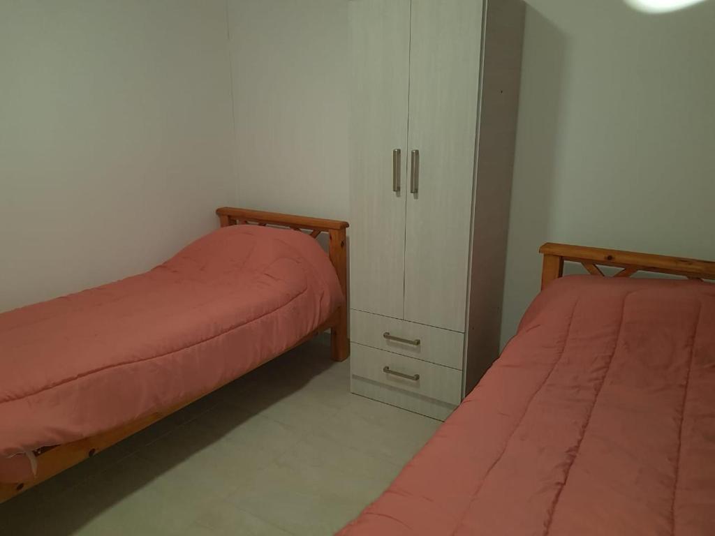 Postel nebo postele na pokoji v ubytování Complejo San Emilio