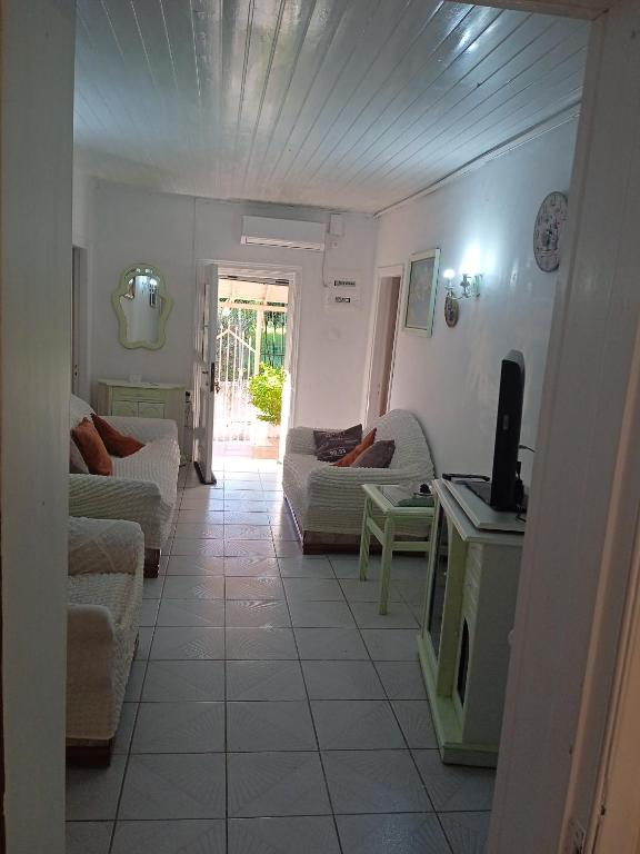 A seating area at Villa Angela, Traditional Villa in the village