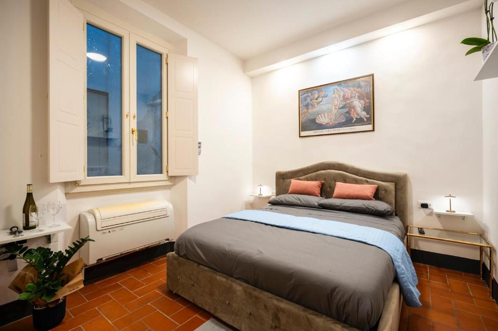 Postel nebo postele na pokoji v ubytování Venus Suite Duomo Square