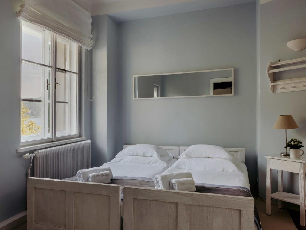 Postel nebo postele na pokoji v ubytování Villa Weiss