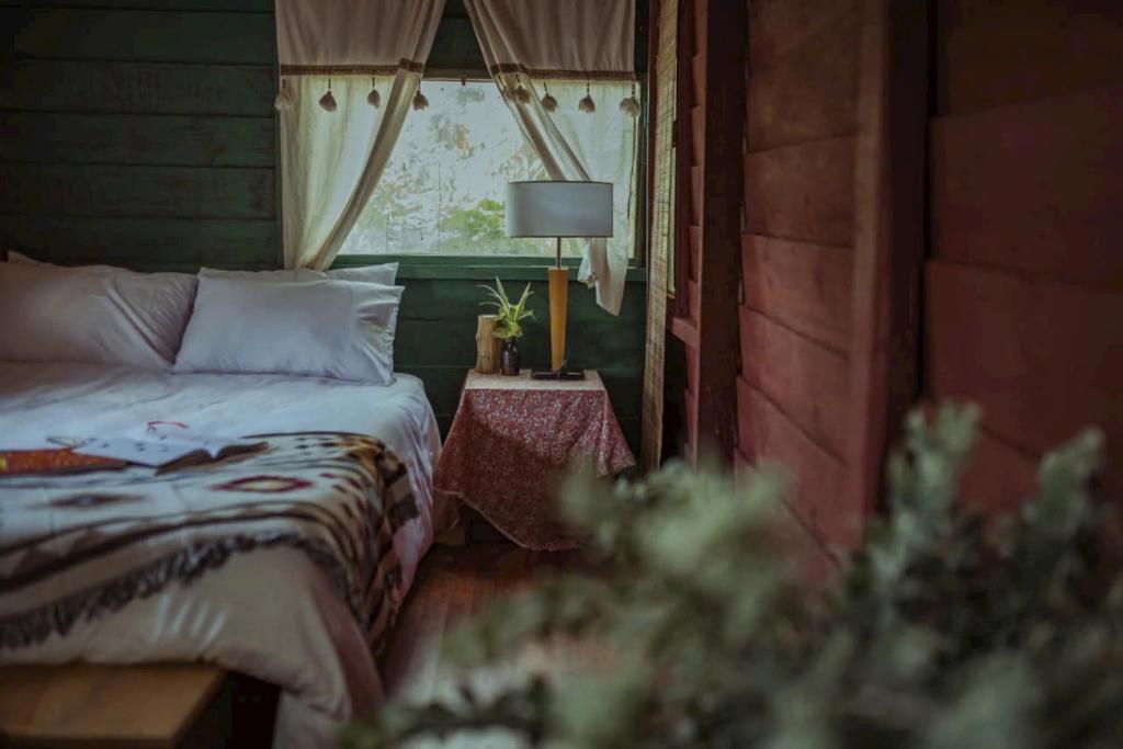 Voodi või voodid majutusasutuse Nắng Xinh Homestay toas