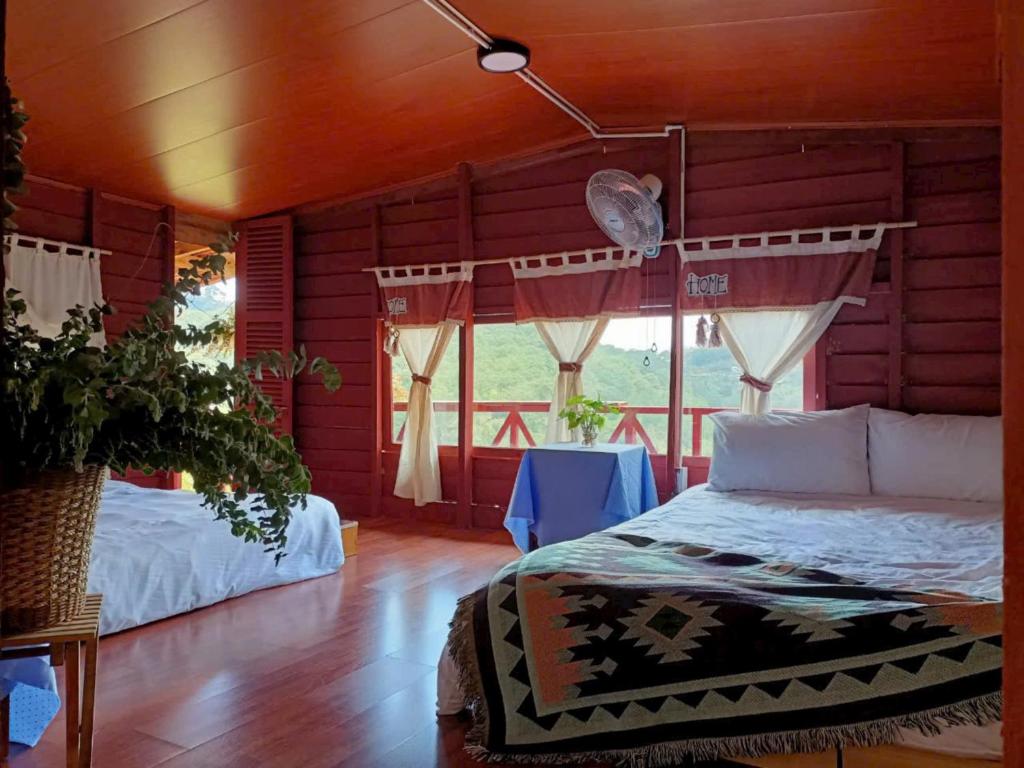 Voodi või voodid majutusasutuse Nắng Xinh Homestay toas