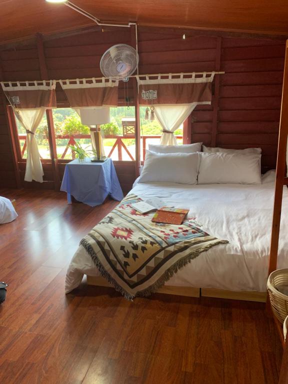 Voodi või voodid majutusasutuse Nắng Xinh Homestay toas