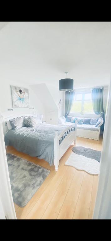 Postel nebo postele na pokoji v ubytování Sonas House