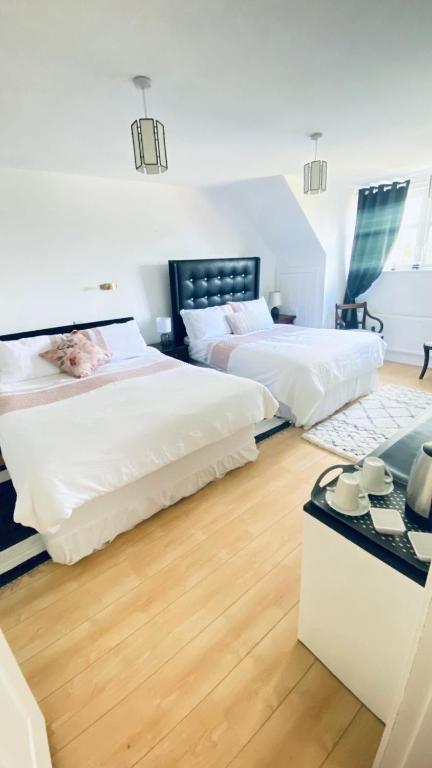 Postel nebo postele na pokoji v ubytování Sonas House