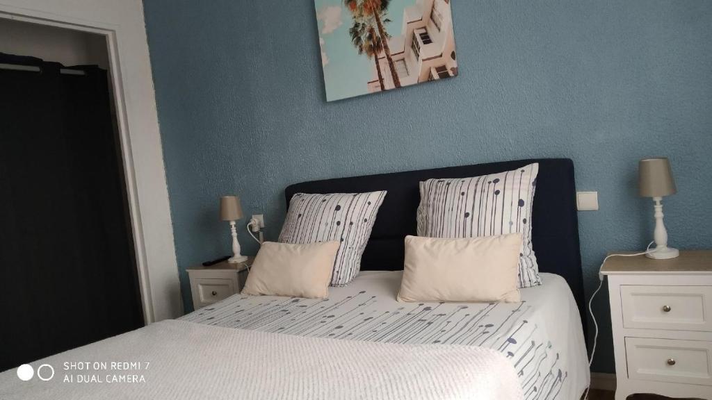 Posteľ alebo postele v izbe v ubytovaní APPARTEMENT T2 confort,Parking,balcon,près Parc des Expositions,10 minutes plage