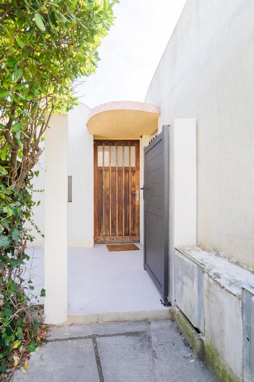 Fotografia z galérie ubytovania VILLA BORD DE MER 6 COUCHAGES AVEC JARDIN ET GARAGE v destinácii La Grande-Motte