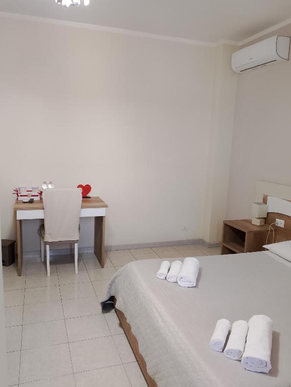 Postel nebo postele na pokoji v ubytování B&B AEREOSTATION