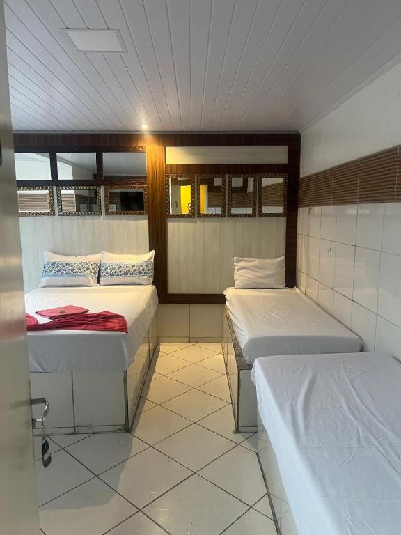Postel nebo postele na pokoji v ubytování Monte Bello