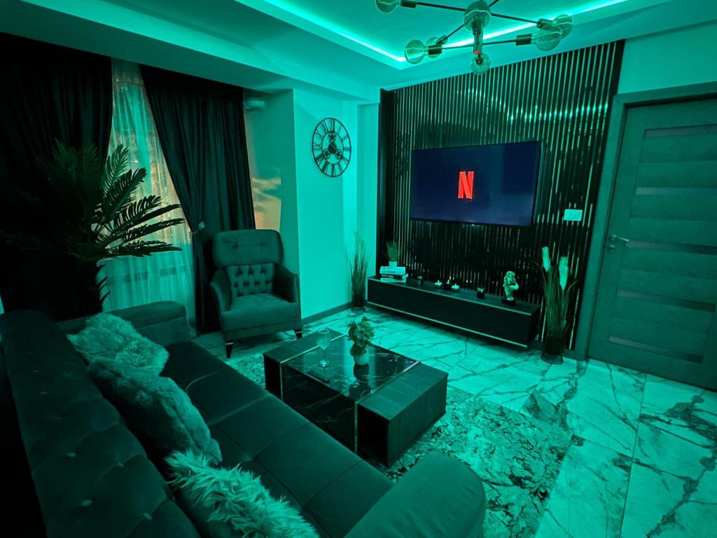 Χώρος καθιστικού στο Cozy Escape Apartment