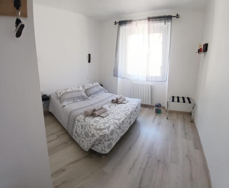 Postel nebo postele na pokoji v ubytování L'Aurigast
