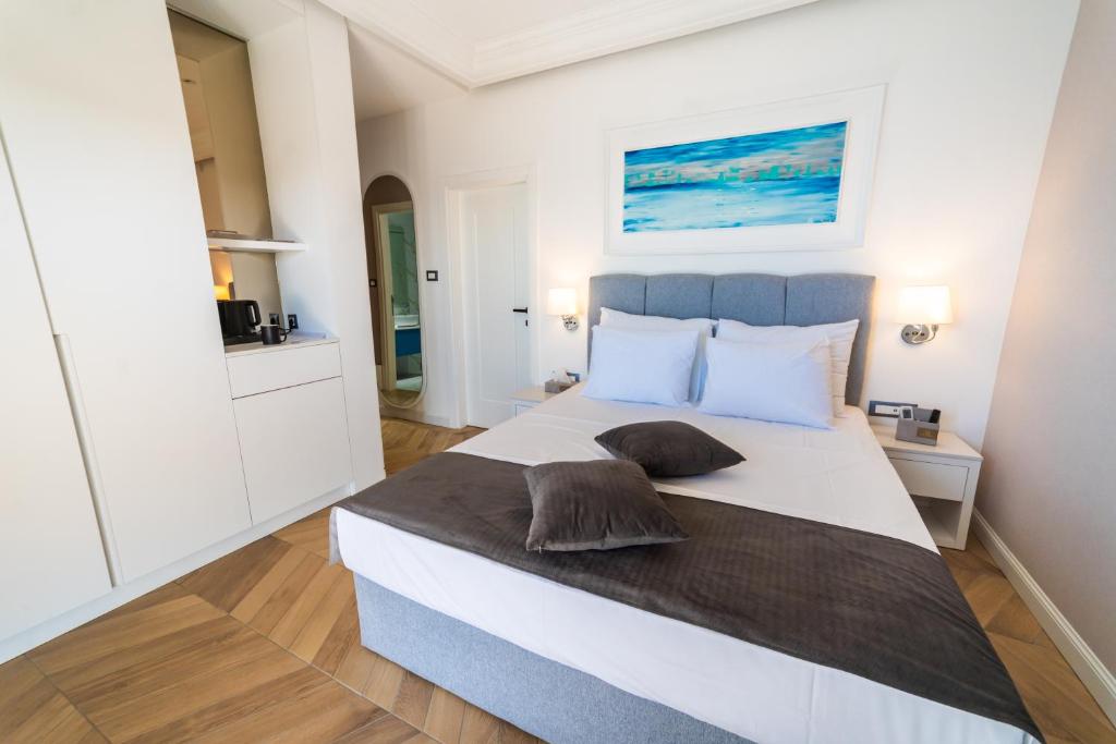 Postel nebo postele na pokoji v ubytování Exclusive Hotel