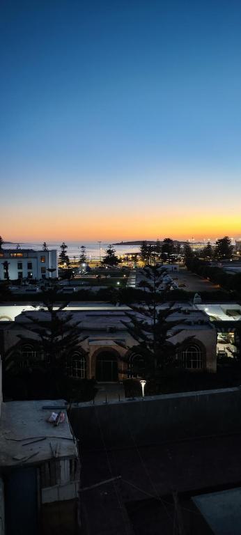 a view of a parking lot at sunset at Moroccan Riad With Panoramic Sea View in Essaouira